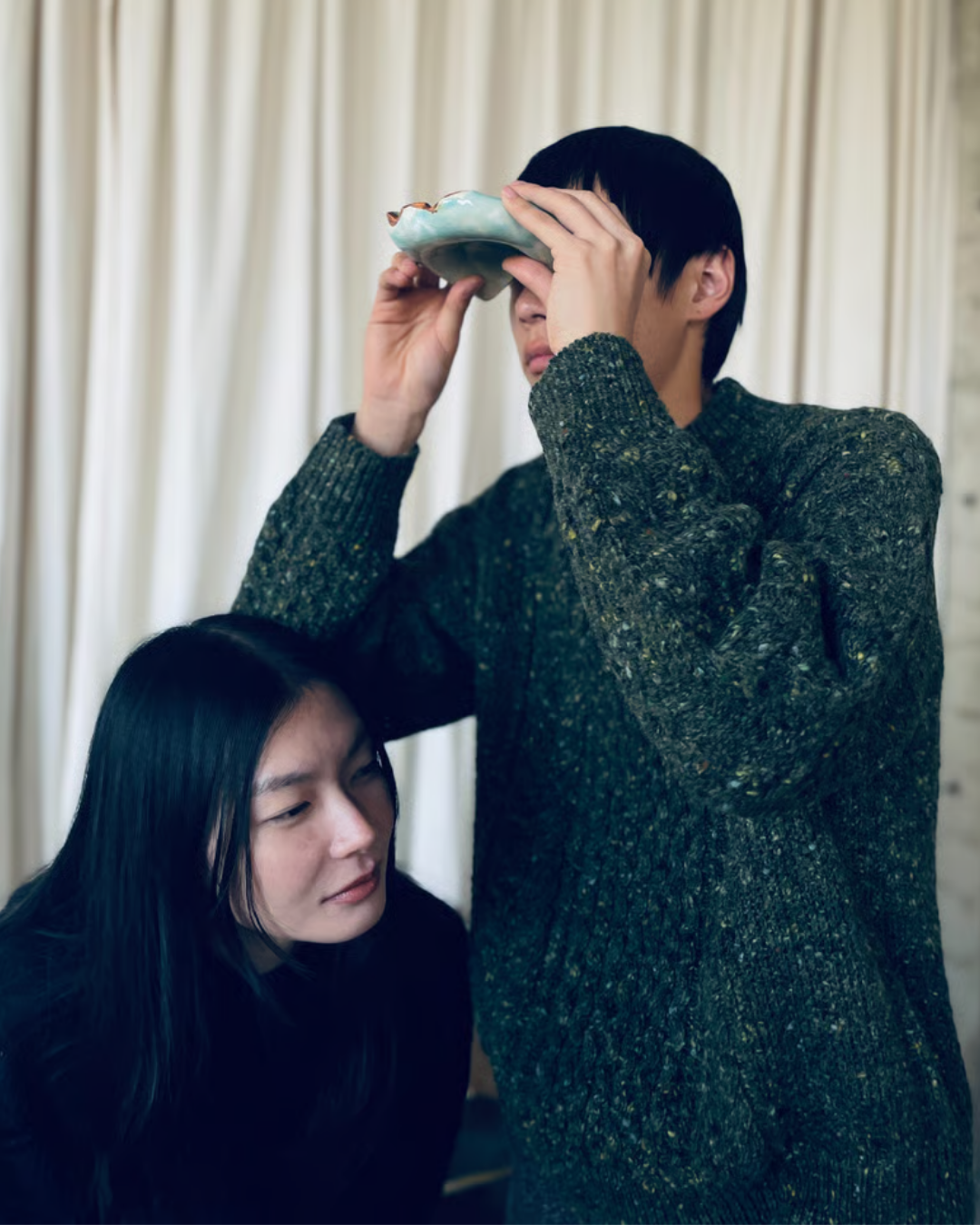 green sweater
