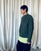green sweater
