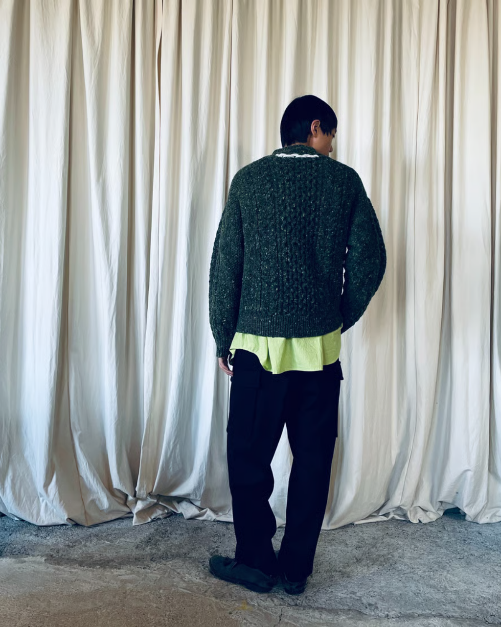 green sweater