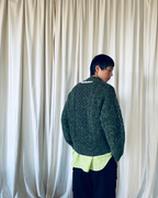 green sweater