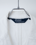 CALCÈLのPolo by Ralph Laurenオフホワイトの3ボタンジャケットの襟元とブランドタグ