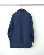 CALCÈLで取り扱うPolo by Ralph Laurenのネイビーのユーティリティジャケット。茶色のコーデュロイ襟が特徴的な背面ショット