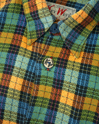 CALCÈLのKey West Shirts長袖シャツ。オレンジ、青、緑、黄の多色チェック柄で、KWロゴ入りボタンとブランドタグが特徴の織り地シャツ