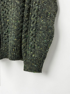 green sweater