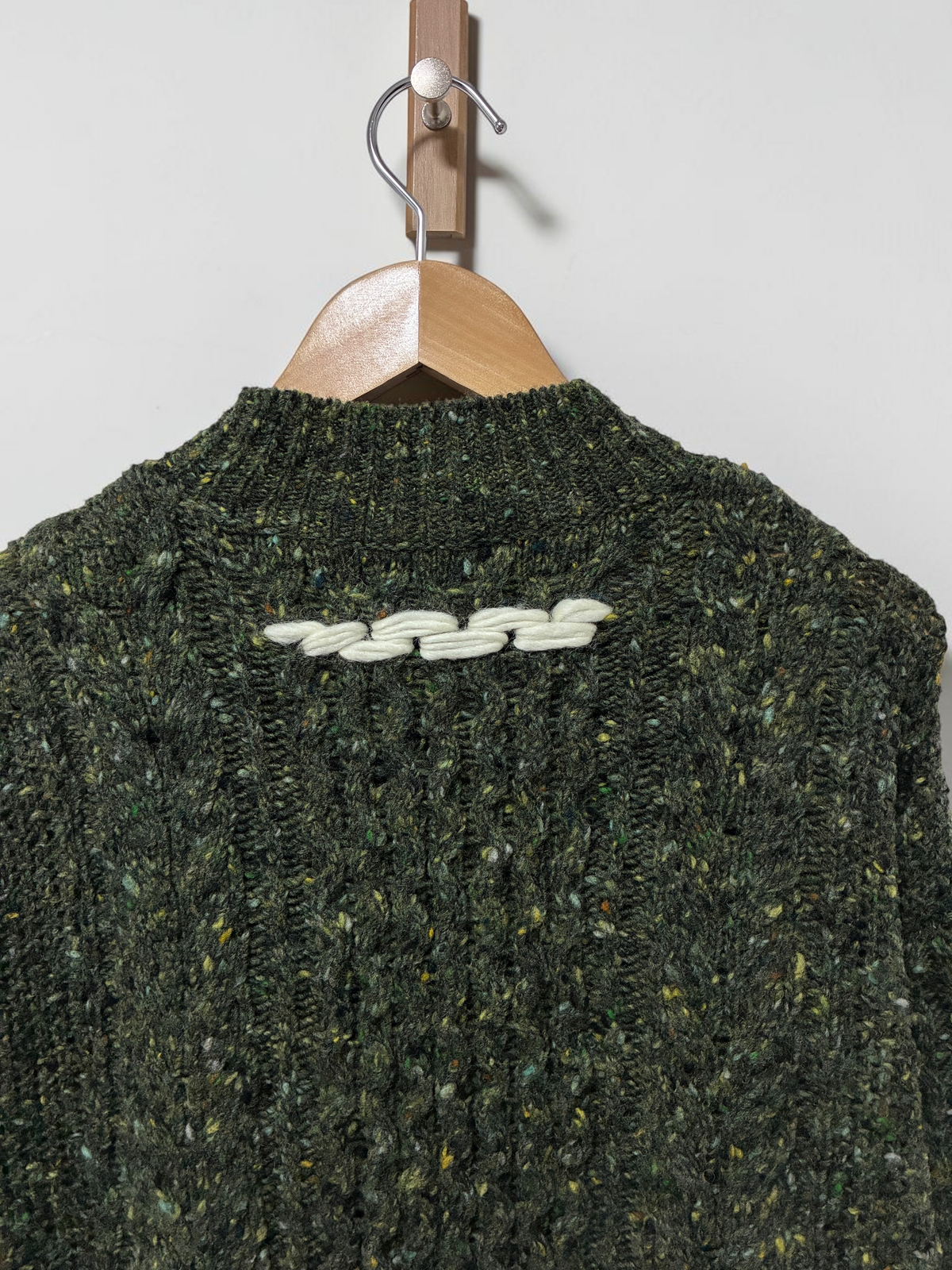 green sweater